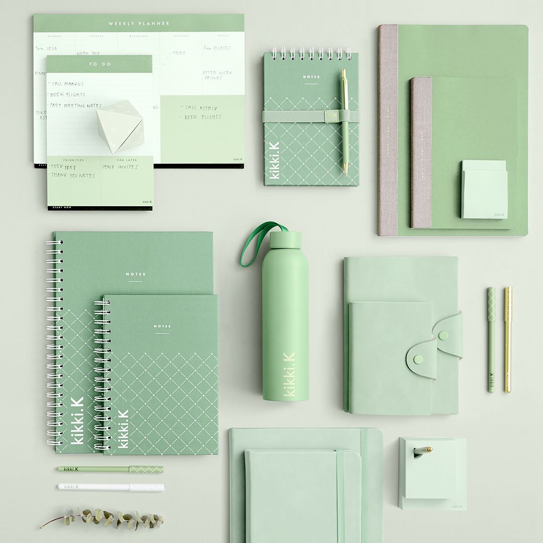Sage green stationery kit with planner, notebooks, bottle and pens